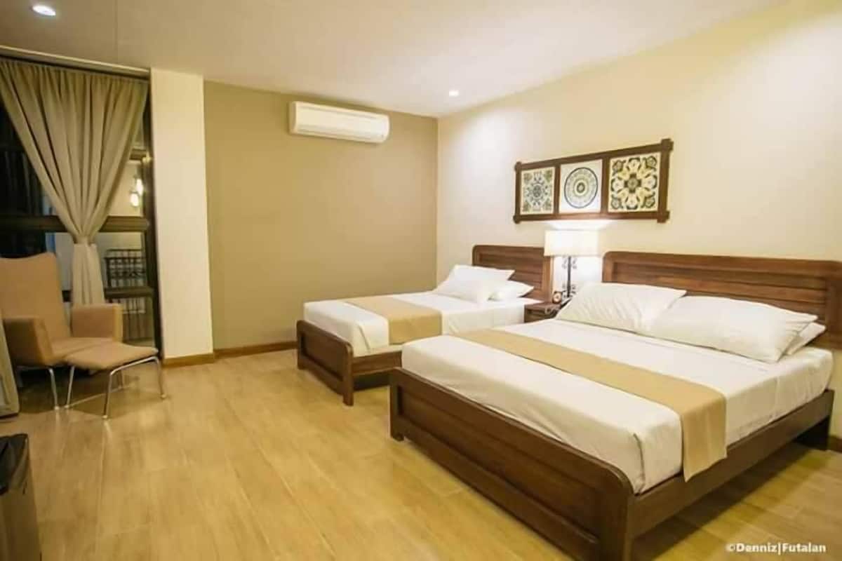 family room | premium bedding, individually decorated, desk, laptop workspace