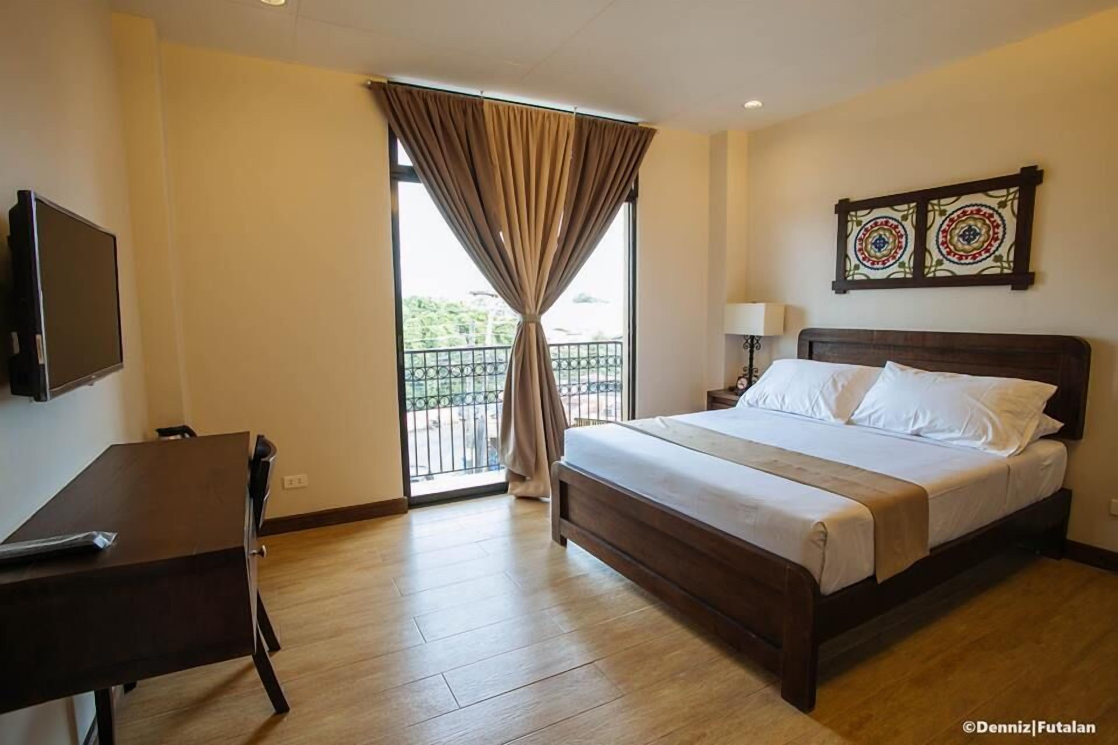 superior deluxe matrimonial | premium bedding, individually decorated, desk, laptop workspace