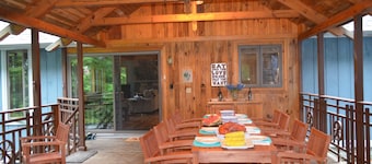 Spacious Sebago Lake waterfront house with game room, hot tub, and covered deck.
