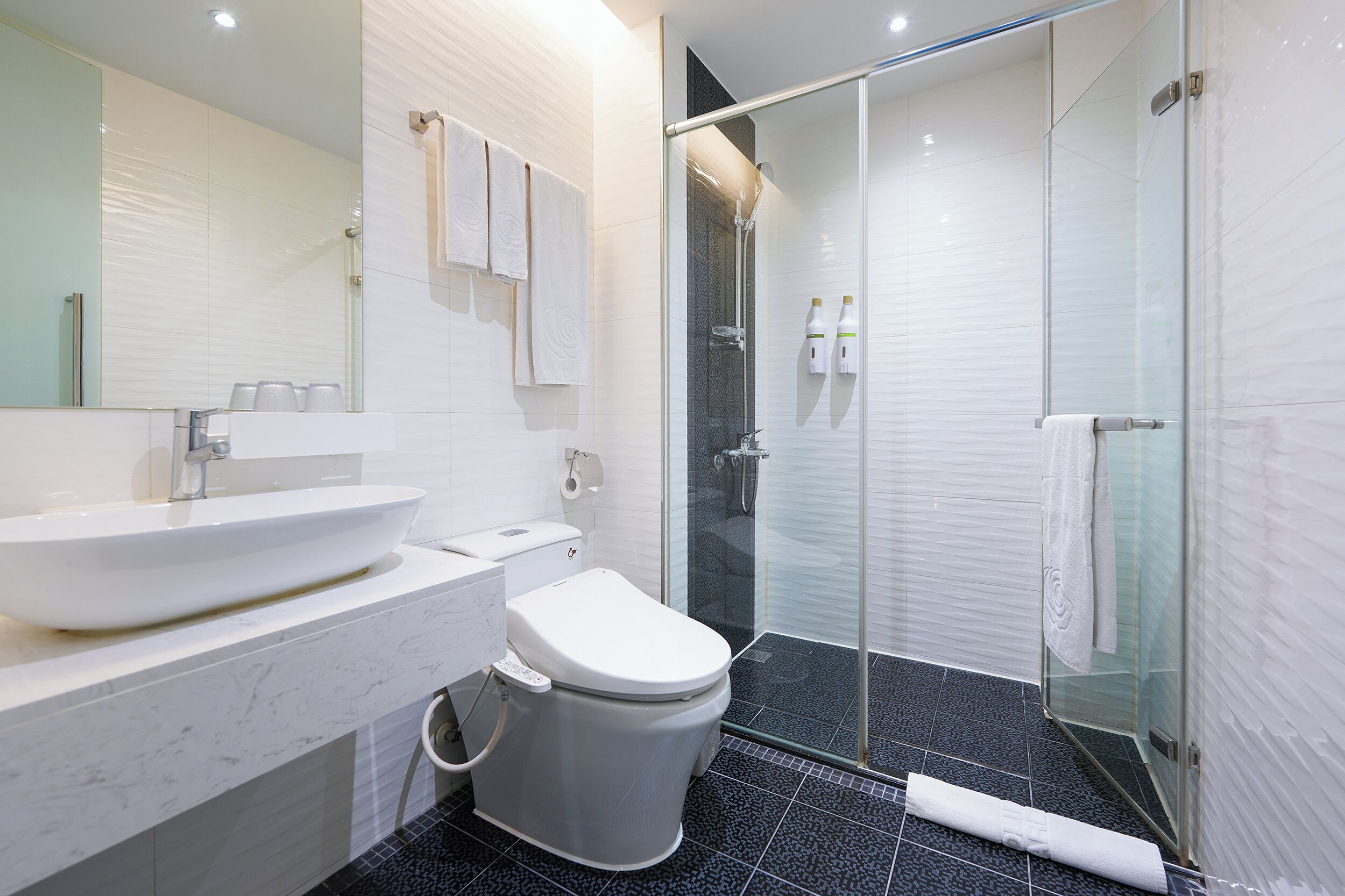 shower, rainfall showerhead, eco-friendly toiletries, hair dryer