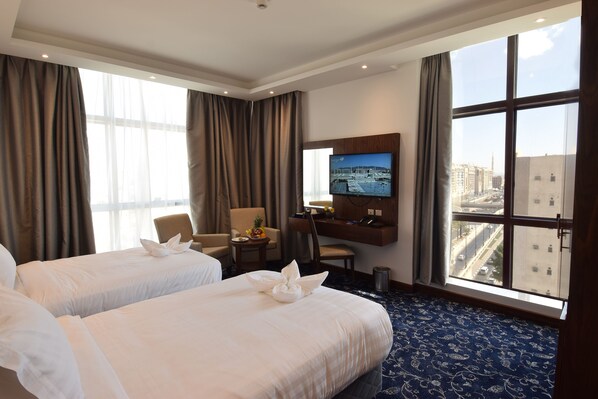 Twin Room, 2 Twin Beds | In-room safe, blackout drapes, soundproofing, iron/ironing board - Zaha Al Munawara Hotel (Madinah)