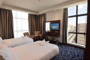 Chambre avec lits jumeaux, 2 lits une place | Coffres-forts dans les chambres, rideaux occultants