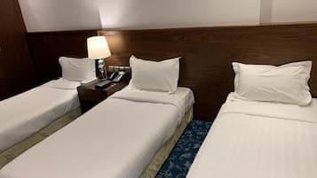 Family Triple Room | In-room safe, blackout drapes, soundproofing, iron/ironing board
