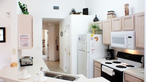 A modern kitchen with white appliances, a built-in oven, and a sink. - Ip60144 - Westridge - 4 Bed 3 Baths Villa (Davenport)