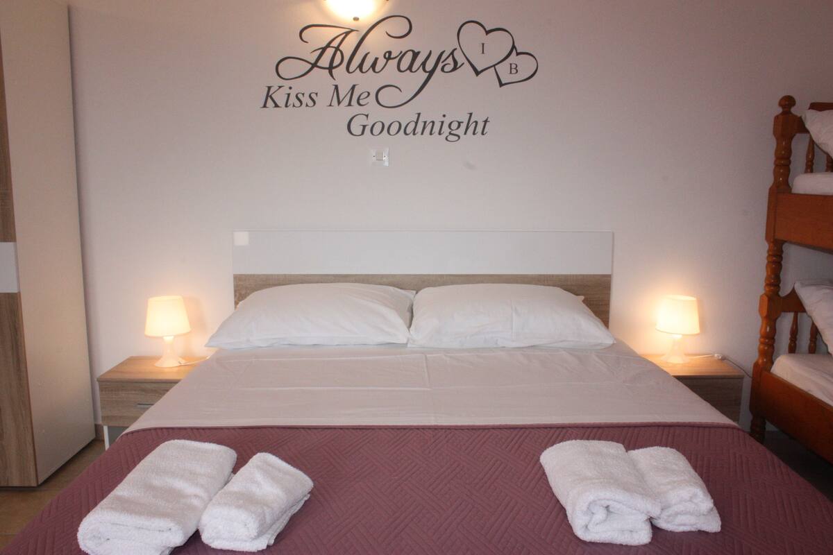 Desk, free cots/infant beds, free WiFi, bed sheets