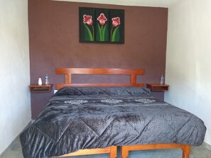 Standard Room, 1 King Bed | 1 bedroom, iron/ironing board, free WiFi, bed sheets