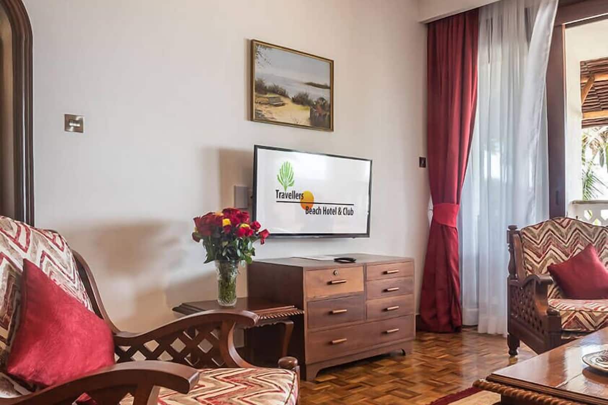 junior suite | living area | 32-inch smart tv with cable channels, tv