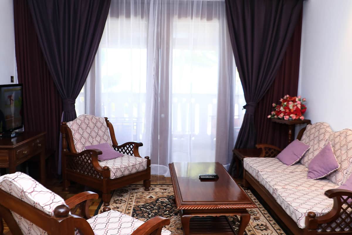 junior suite | living area | 32-inch smart tv with cable channels, tv