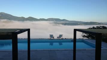Seasonal outdoor pool, pool umbrellas, sun loungers