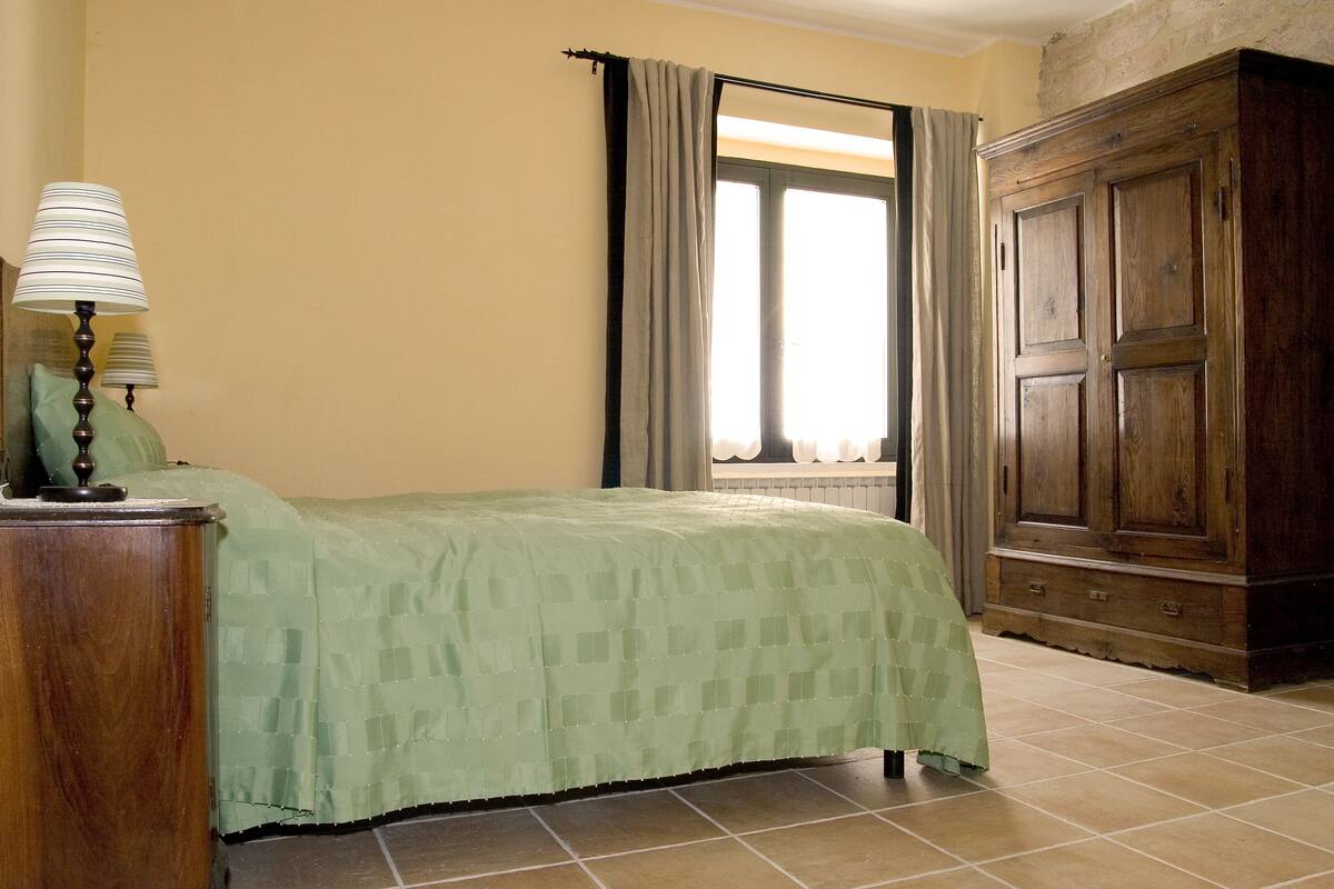 Apartment, 1 Bedroom (Frassino) | 1 bedroom, desk, iron/ironing board, free cots/infant beds