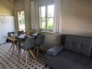 Classic Apartment, Balcony, Mountain View | In-room dining