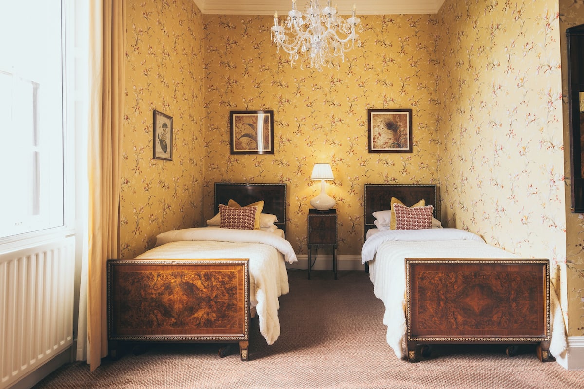 Avenue Room | Individually decorated, individually furnished, desk, iron/ironing board