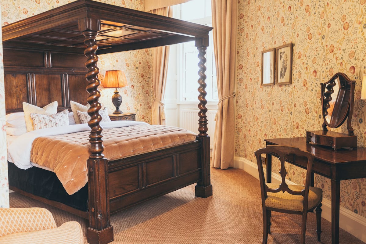 Oak Room | Individually decorated, individually furnished, desk, iron/ironing board