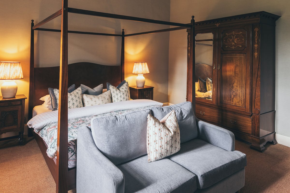 Cedar Room | Individually decorated, individually furnished, desk, iron/ironing board