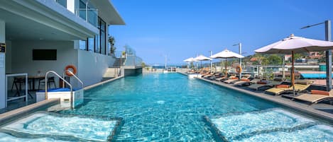 Outdoor pool, open 7 AM to 8:00 PM, sun loungers