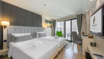 2 habitaciones, minibar y caja de seguridad en la habitación