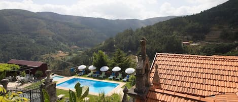 Outdoor pool, pool umbrellas, pool loungers