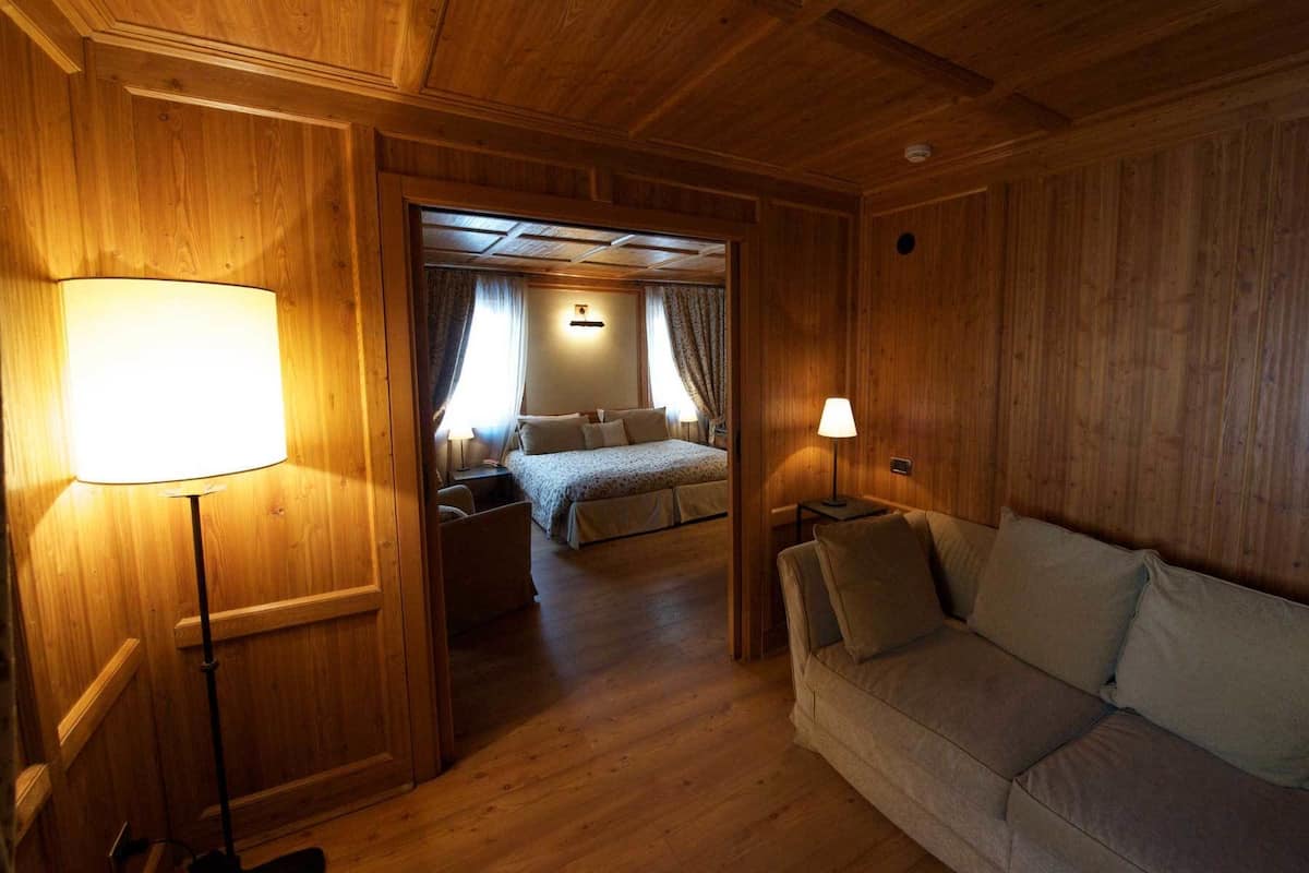 Superior Double Room | Living area | Flat-screen TV, heated floors