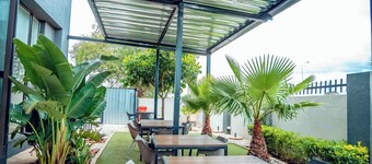 Cycad Palm Hotel