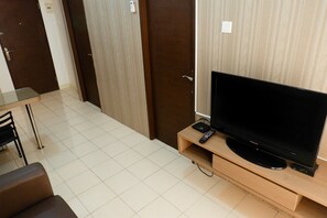 Room | Living area | TV - Puri Park View Apartment with Balcony (Jakarta)