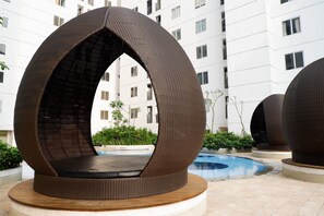 Outdoor pool - Affordable Bassura City Apartment (Jakarta)