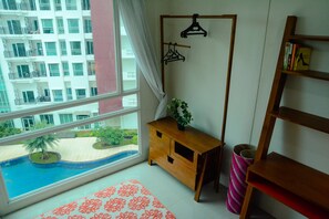 Quarto | Área de estar | TV