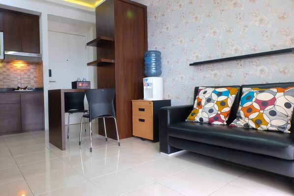 Quarto | Área de estar | TV
