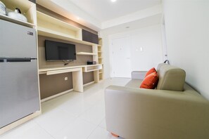 Habitación | Área de sala de estar | Televisión 