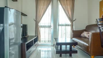Habitación | Área de sala de estar | Televisión