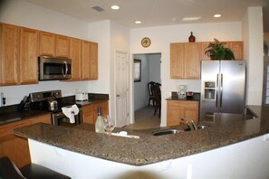 Family Villa, Hot Tub, Garden Area | Shared kitchen