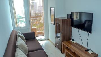 Habitación | Área de sala de estar | Televisión