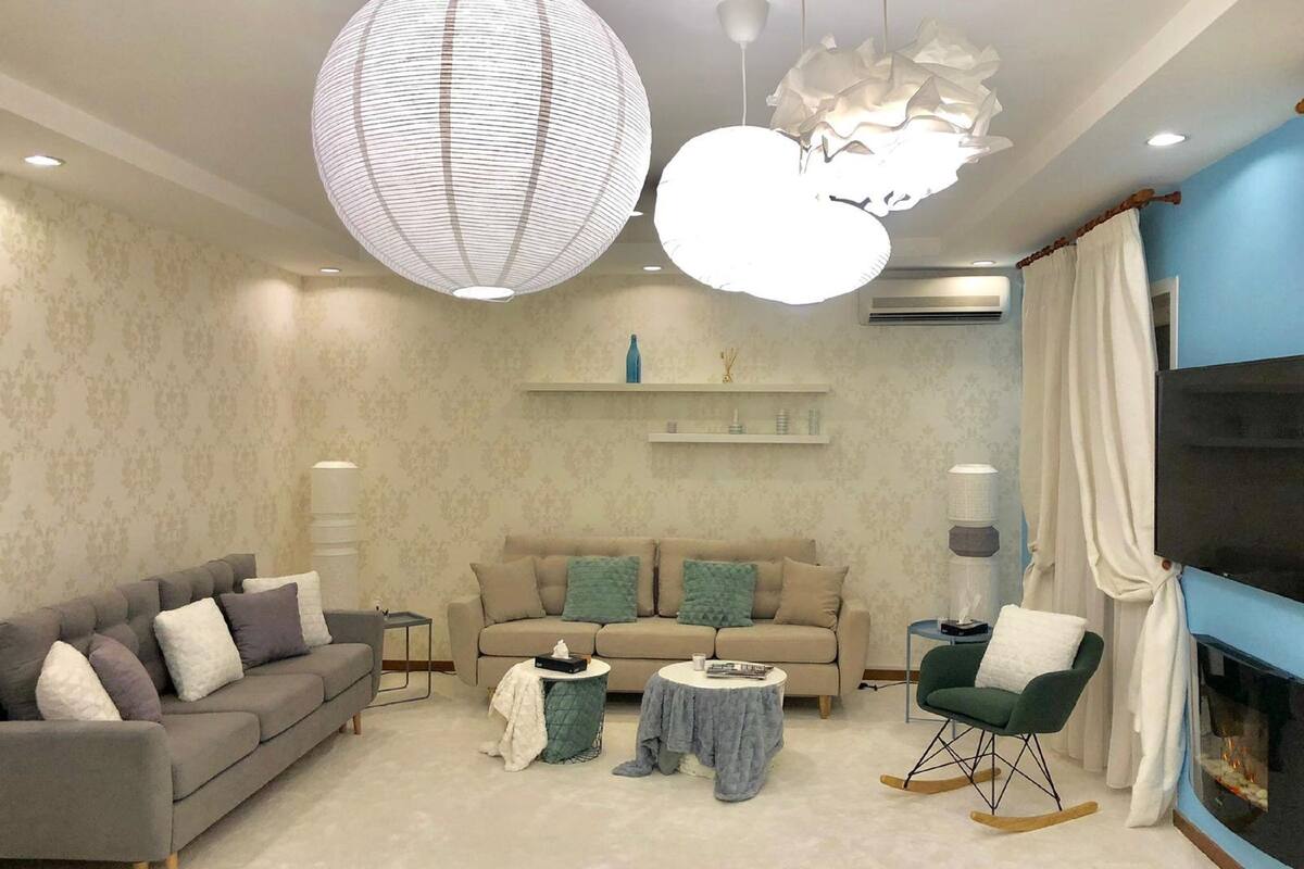 Premium Apartment, 2 Bedrooms, Pool Access, Courtyard View | Living room | 160-cm Smart TV with digital channels, TV, fireplace