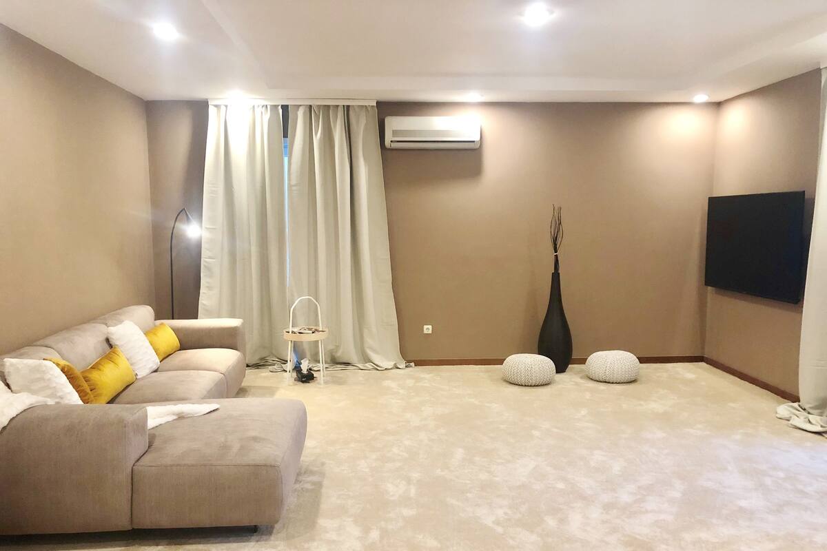 Premium Apartment, 2 Bedrooms, Non Smoking, Pool View | Living room | 160-cm Smart TV with digital channels, TV, fireplace