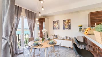Deluxe Apartment, 2 Bedrooms, Balcony, Pool View | In-room dining