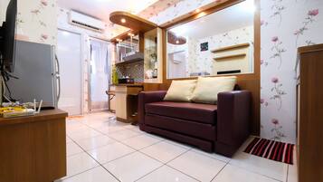 Quarto | Área de estar | TV