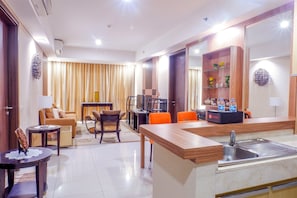 Room | Private kitchen | Fridge, stovetop, cookware/dishes/utensils - Cozy Pool View Kemang Village Residence Apartment with Direct Access to Mall (Jakarta)