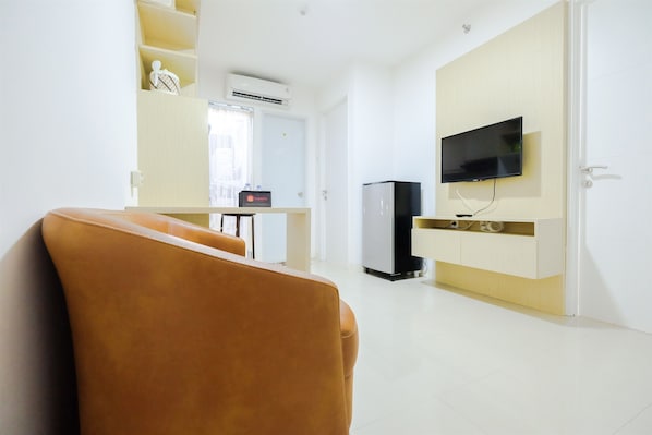 Habitación | Zona de estar | Una televisión