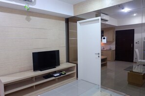 Living area - Casa Grande Apartment with Sofabed Connected to Kota Kasablanka (Jakarta)