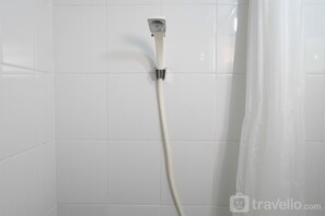 Room | Bathroom shower - Cozy Studio at Bassura Apartment near to Bassura Mall (Jakarta)