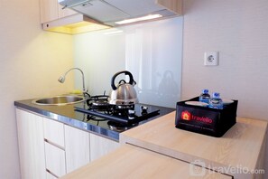 Private kitchenette - Cozy Studio at Bassura Apartment near to Bassura Mall (Jakarta)