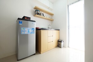 Chambre | Coin cuisine privé | Réfrigérateur, plaque de cuisson, bouilloire électrique