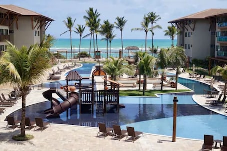 Outdoor pool, open 7 AM to 9 PM, pool umbrellas, sun loungers