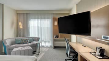 Desk, laptop workspace, iron/ironing board, cribs/infant beds