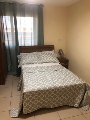 Comfort Apartment, 2 Double Beds, Accessible | 2 bedrooms, iron/ironing board, bed sheets - Isaac Anthony Homes (Accra)
