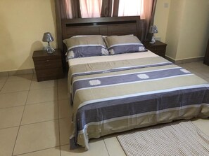 Comfort Apartment, 2 Double Beds, Accessible | 2 bedrooms, iron/ironing board, bed sheets - Isaac Anthony Homes (Accra)