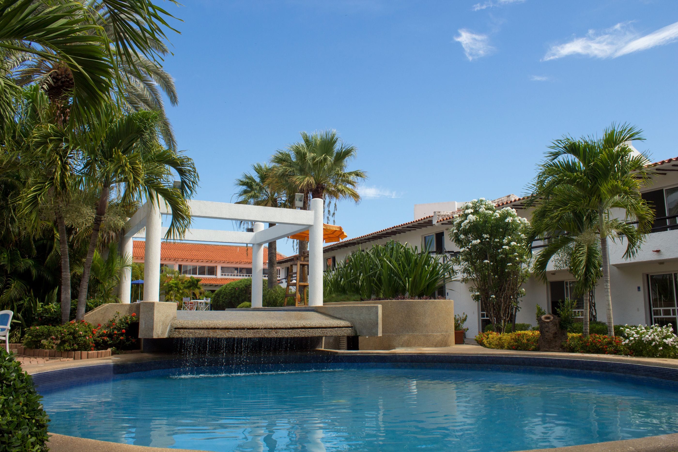 Outdoor pool, open 10 AM to 6 PM, pool umbrellas, sun loungers