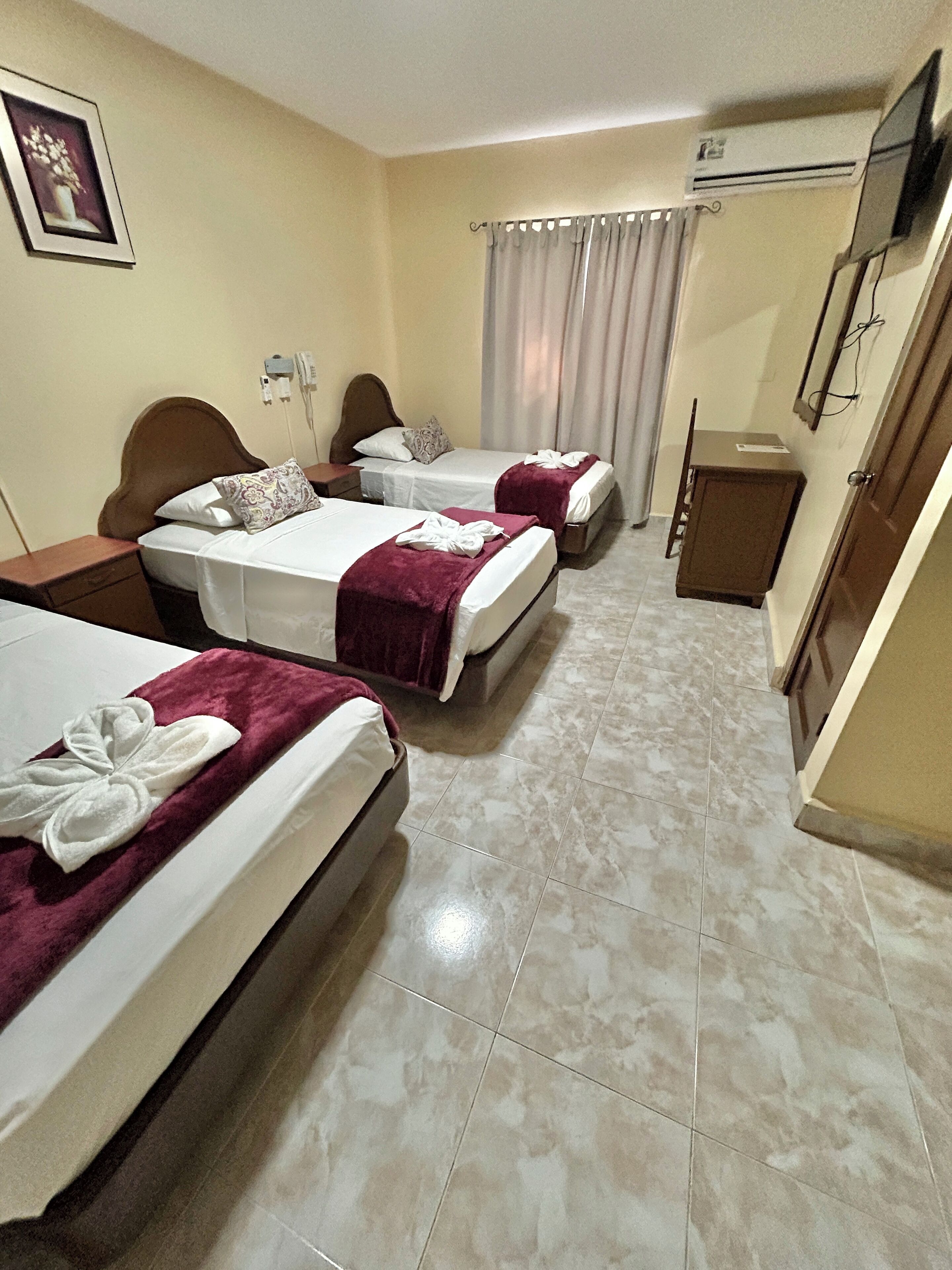 Classic Triple Room, Non Smoking | Desk, laptop workspace, blackout curtains, iron/ironing board