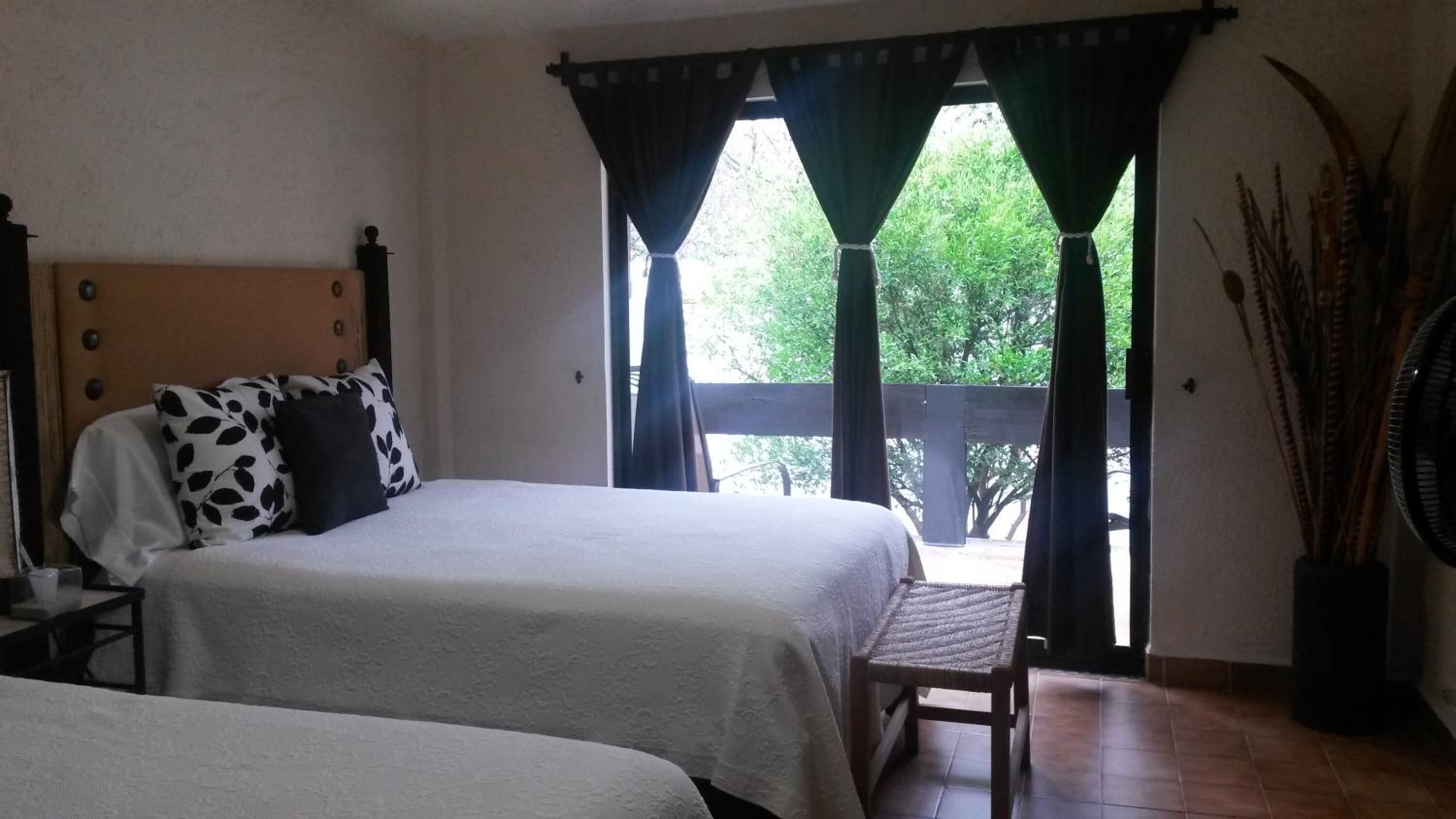 premium bedding, blackout curtains, free wifi, bed sheets