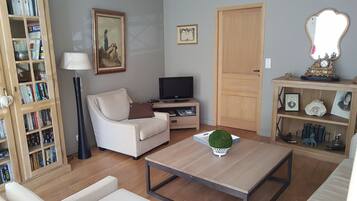 Casa geminada conforto | Área de estar | TV de tela plana