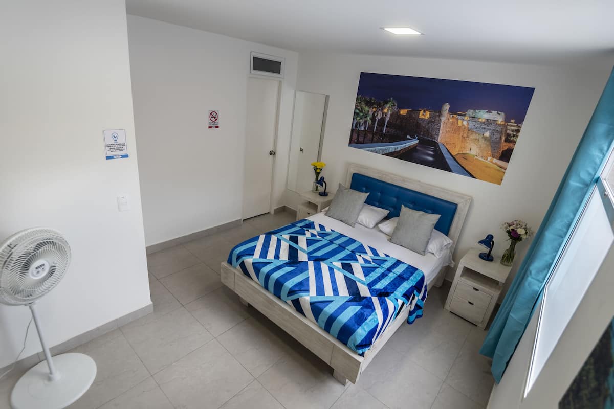Deluxe Double Room, Non Smoking | In-room safe, blackout drapes, iron/ironing board, free WiFi
